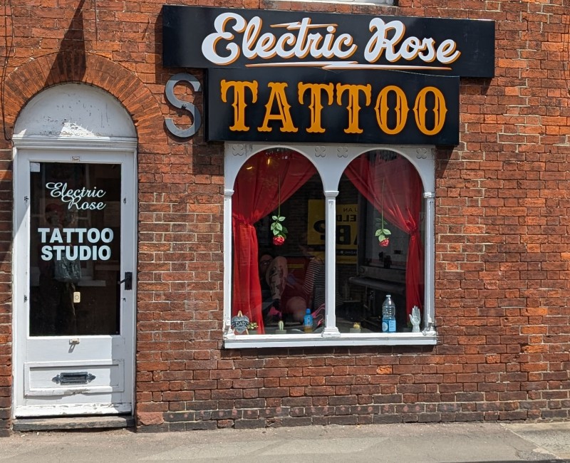Electric Rose Tattoo